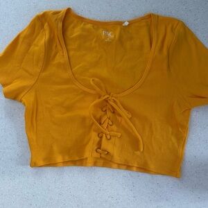 NWOT Medium PAC Sun PAC Cares orange Crop Top. scoop Neck. Tie-Front Crop Top